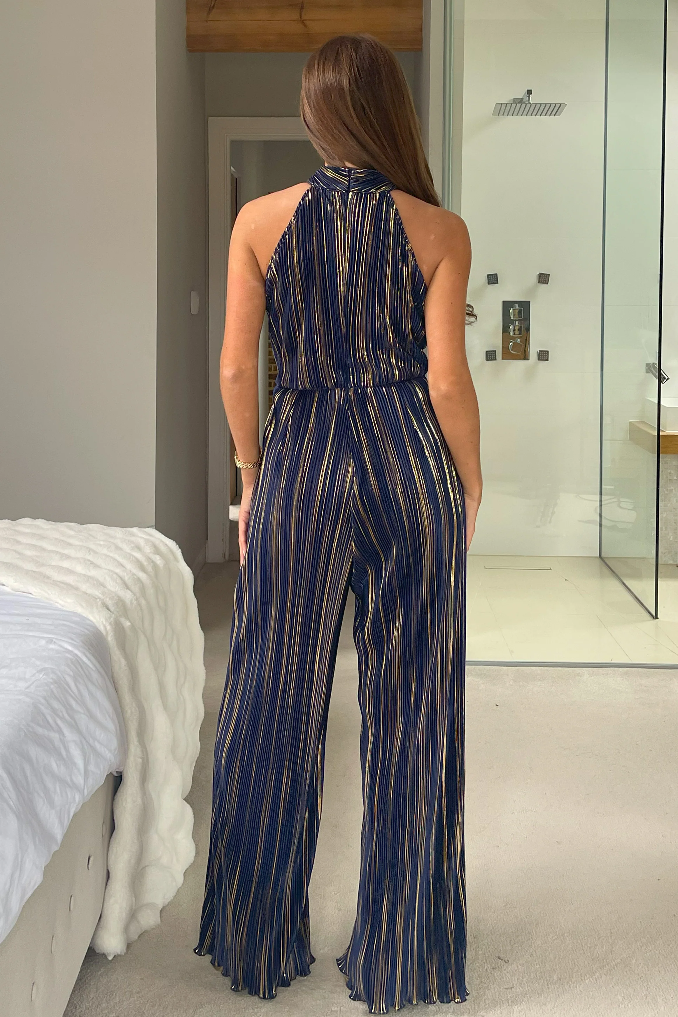 Gwen Halter Neck Plisse Jumpsuit in Navy and Gold - Image 5